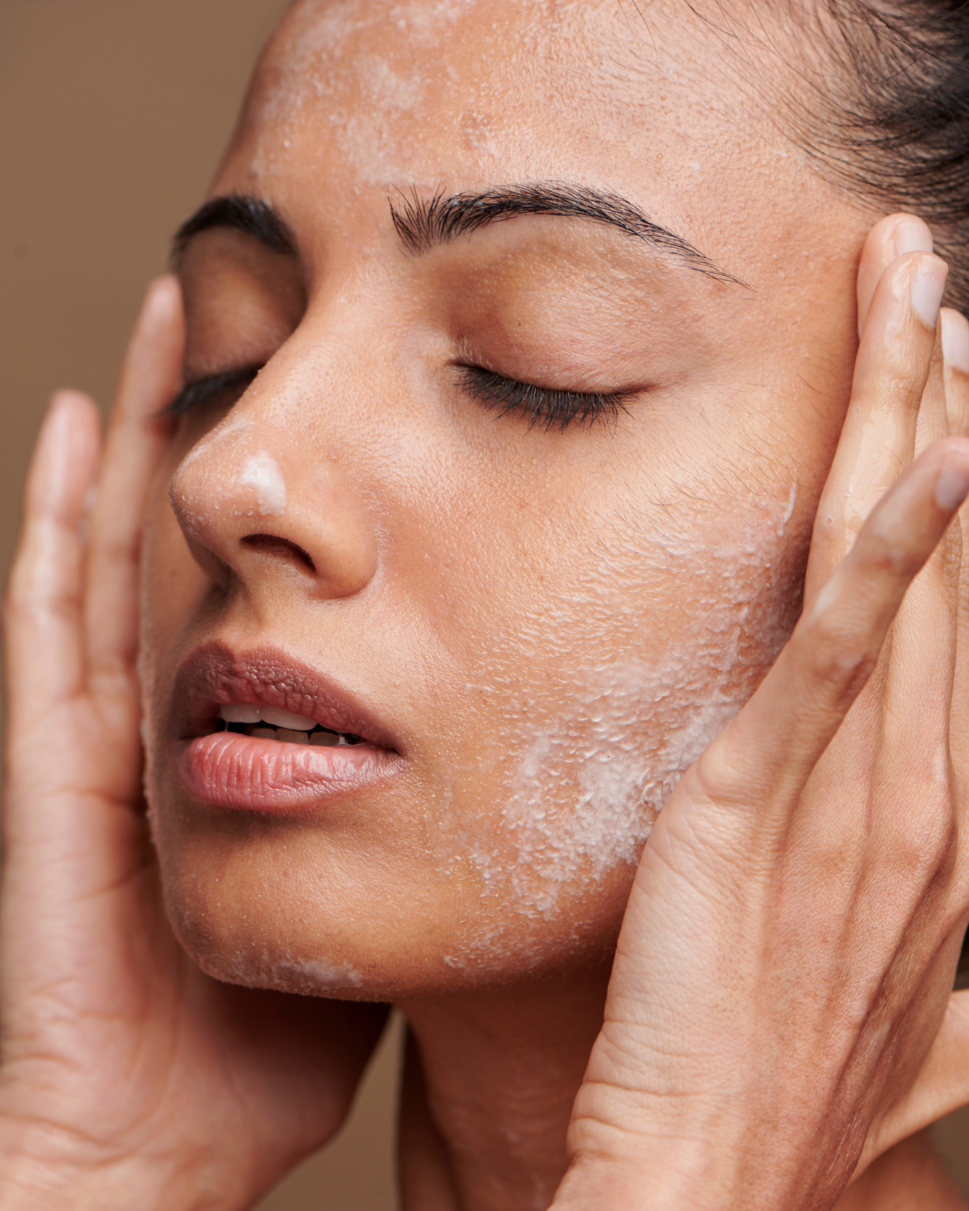 Woman Applying Skincare on Face